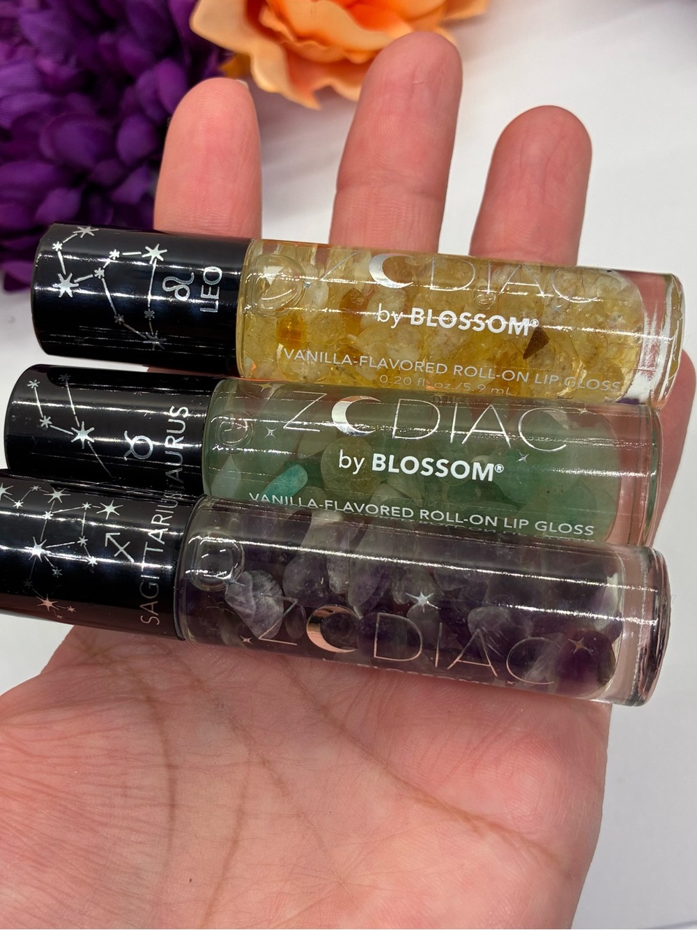 Blossom Roll on Zodiac Vanilla Lip Gloss w/ Stone Chips